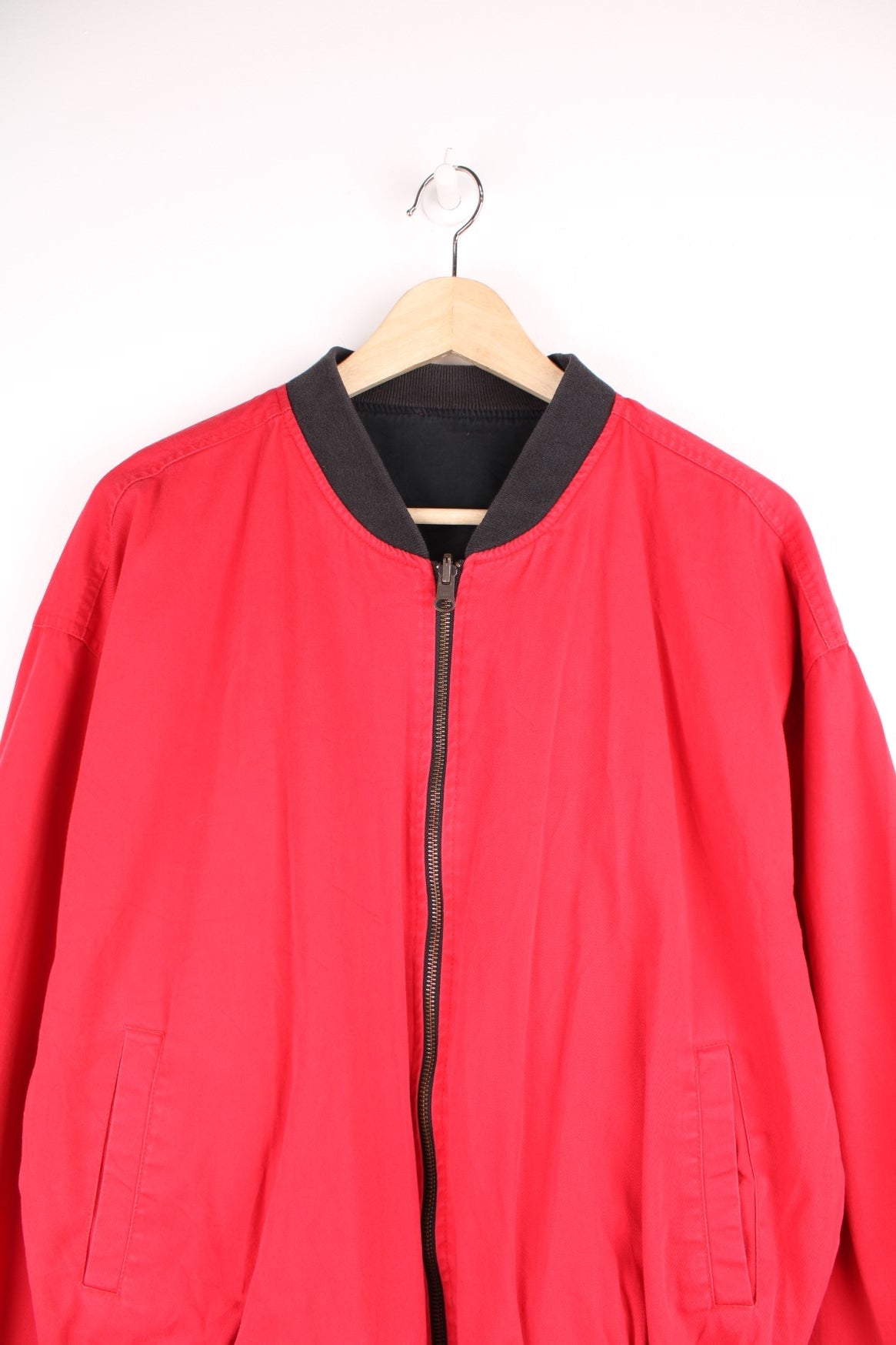 Vintage Marlboro reversible bomber jacket in red and black. Features embroidered spell out logo on the back, and embroidered "M" on the sleeve. 