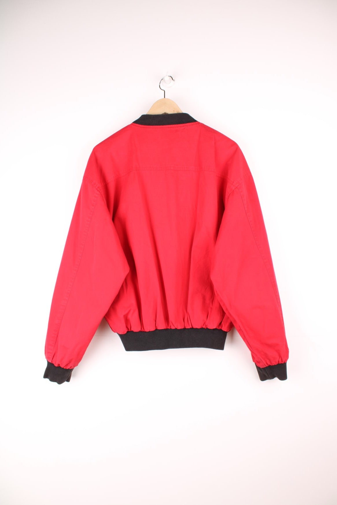 Vintage Marlboro reversible bomber jacket in red and black. Features embroidered spell out logo on the back, and embroidered "M" on the sleeve. 