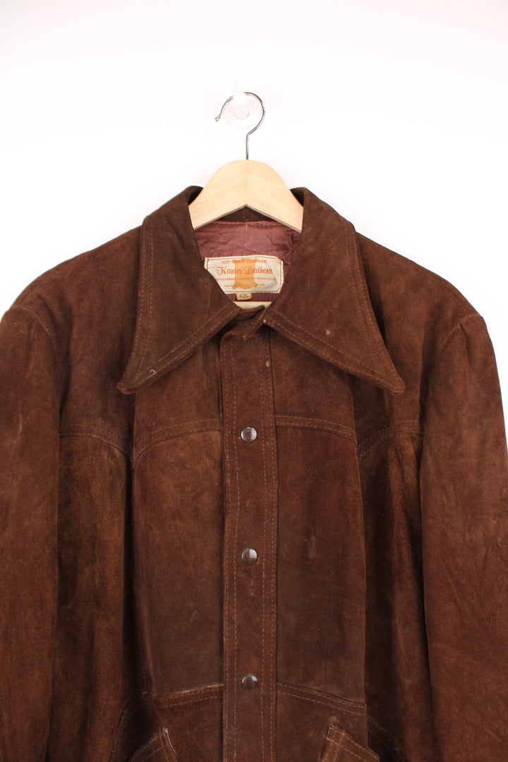 Brown suede western dagger collar jacket with snap closure and two pockets