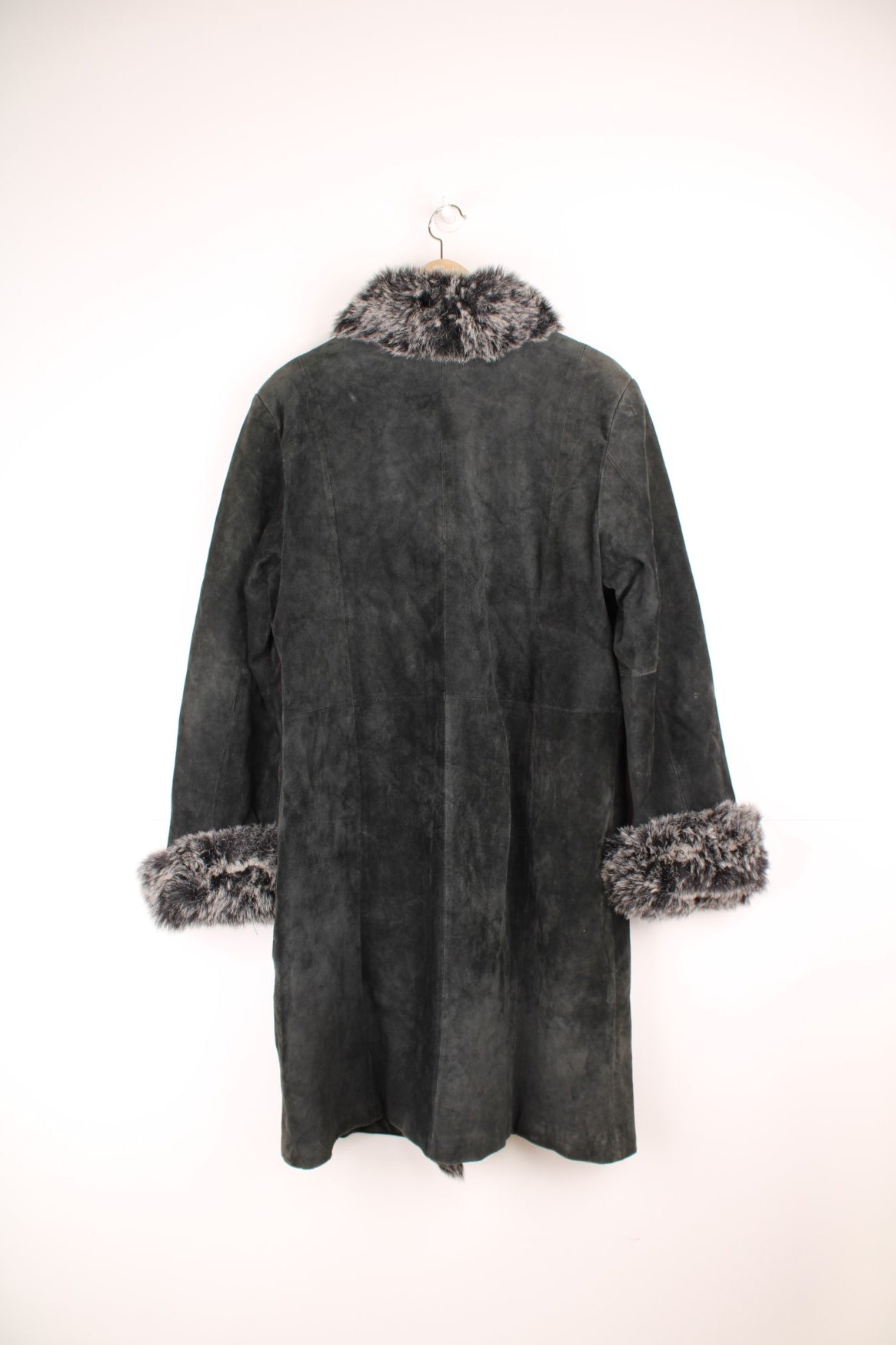 JOY Afghan coat in black suede with faux fur trim, button closure and two side pockets. 