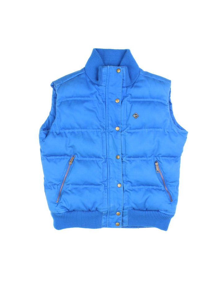 Vintage Y2K Nike Trail Gilet in a blue colourway. Button and zip fastetening with zip side pockets, insulated with branded quilted lining, and swoosh logo embroidered on the front.