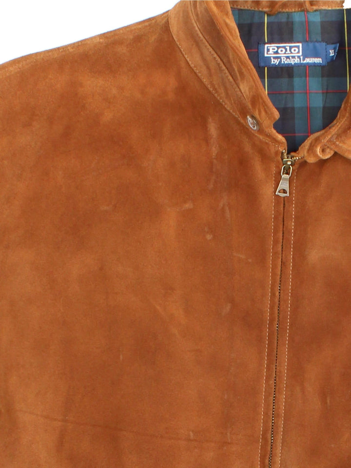 Vintage Polo Ralph Lauren Suede Harrington Jacket in a brown colourway. Zip fastening with checked lining, signature embroidered logo on the chest. 