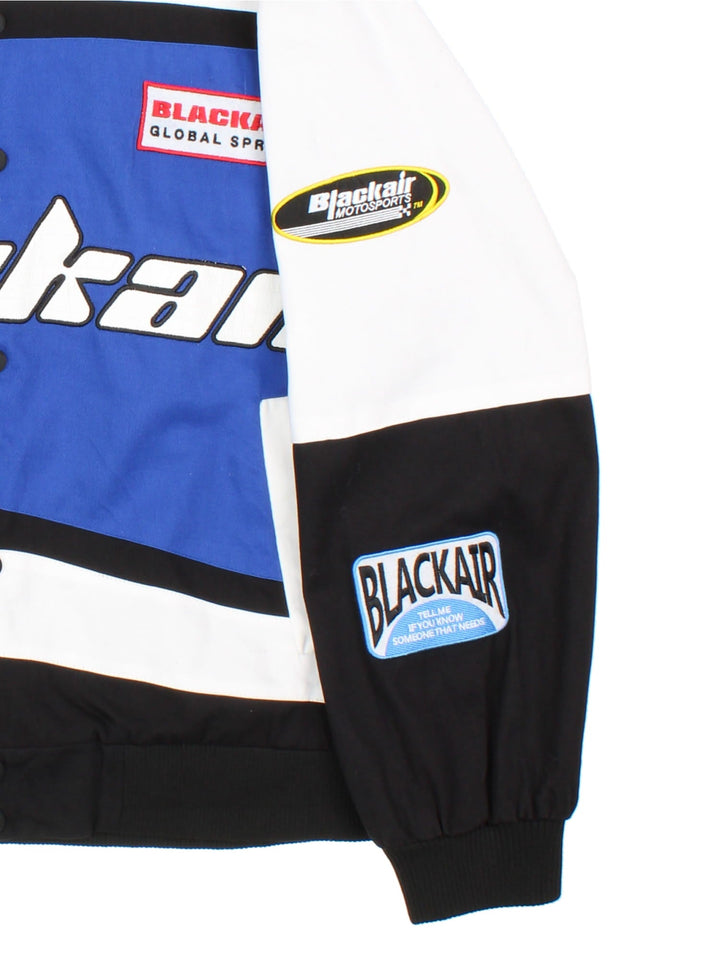 Vintage Blackair Nascar Jacket in a white, blue and black colourway. Buttons up and has side pockets, and all over embroidered logo detailing.