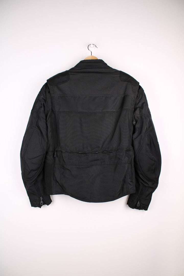 Vintage Harley-Davidson motorcycle jacket in a black colourway. The jacket has a removable lining, protective padding on the elbows and shoulders and multiple exterior and interior pockets.  