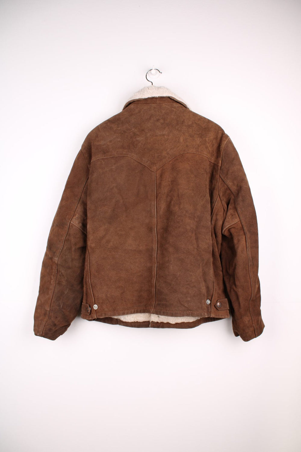 Vintage Schott Rancher Suede Trucker Jacket in brown. The jacket is fully lined with a cream fleece, has a western style yolk panelled front, and press studs to close.  