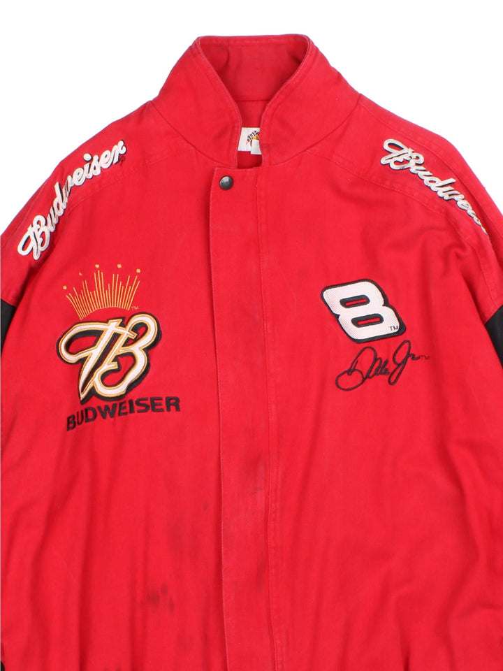 Vintage Nascar Budweiser Racing Jacket in a red and black colourway. Zips up and has side pockets, insulated with a fleece lining, and has the logo and sponsors embroidered on the front and spell out of 'Dale Jr' on the back.