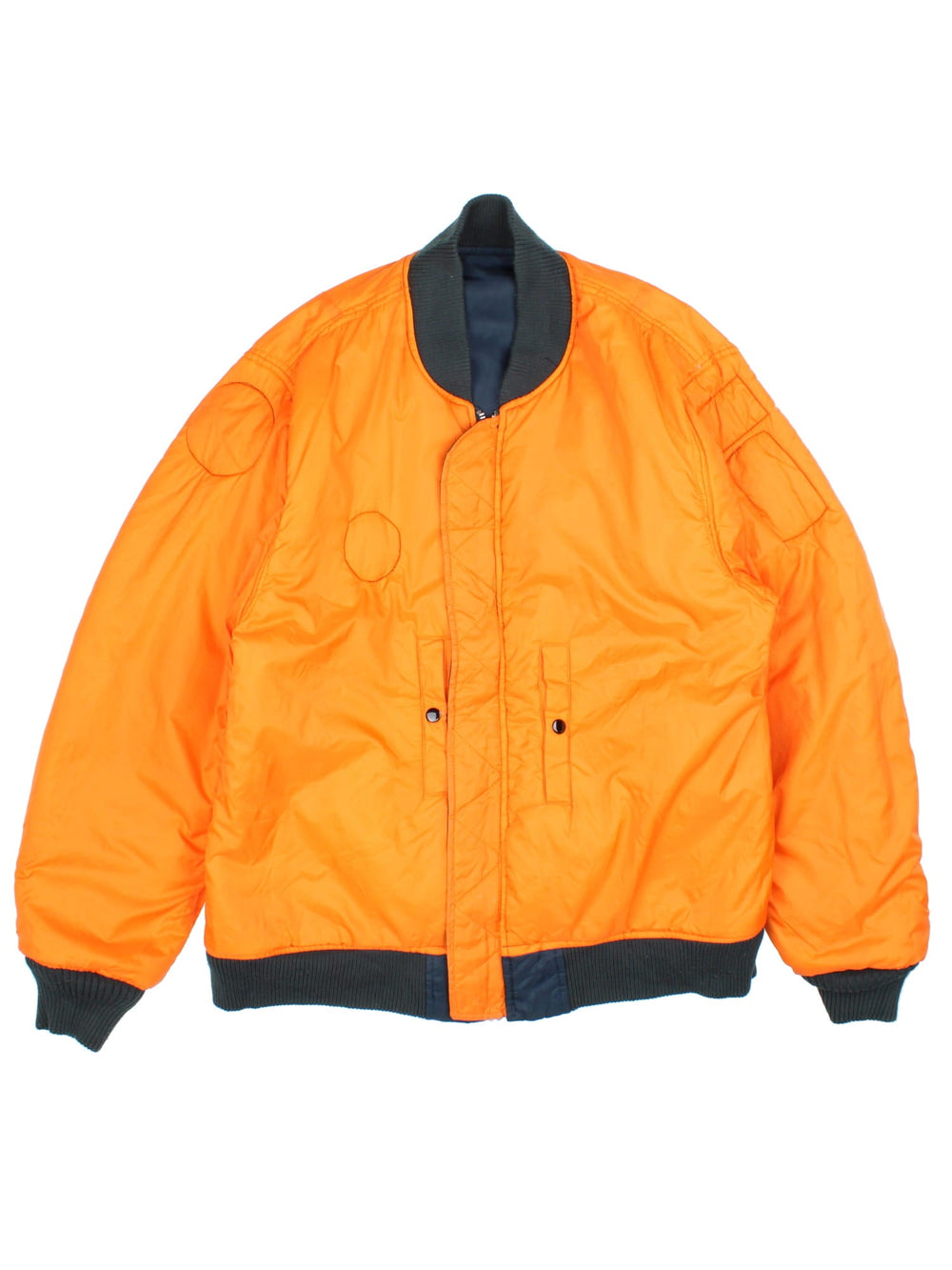 Vintage College Park Fire Department MA1 Reversible Bomber Jacket in either a blue or orange colourway options. Zips up and has side pockets, insulated, and has badge logos embroidered on the front and sleeves.