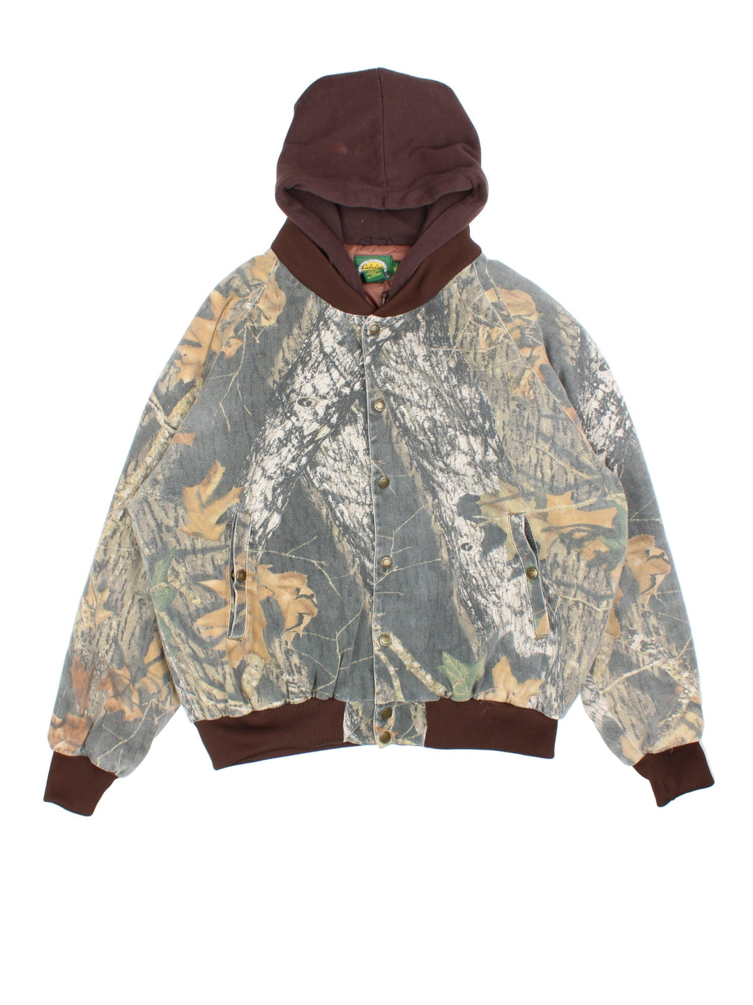 Vintage Cabela's Real Tree Camo Bomber Hunting Jacket in a greenand brown colourway. Zips and buttons up, has side pockets, insulated with a quilted lining, and hooded.