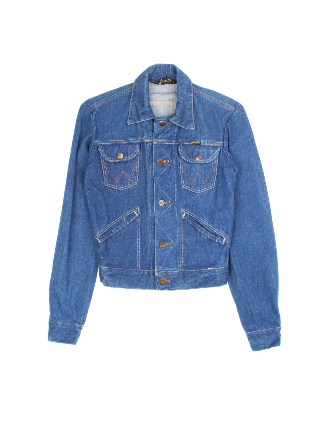 Vintage Wrangler Denim Jacket in a blue colourway. Buttons up and has multiple pockets, contrast cross stitching throughout, and has the logo tab embroidered on the front.