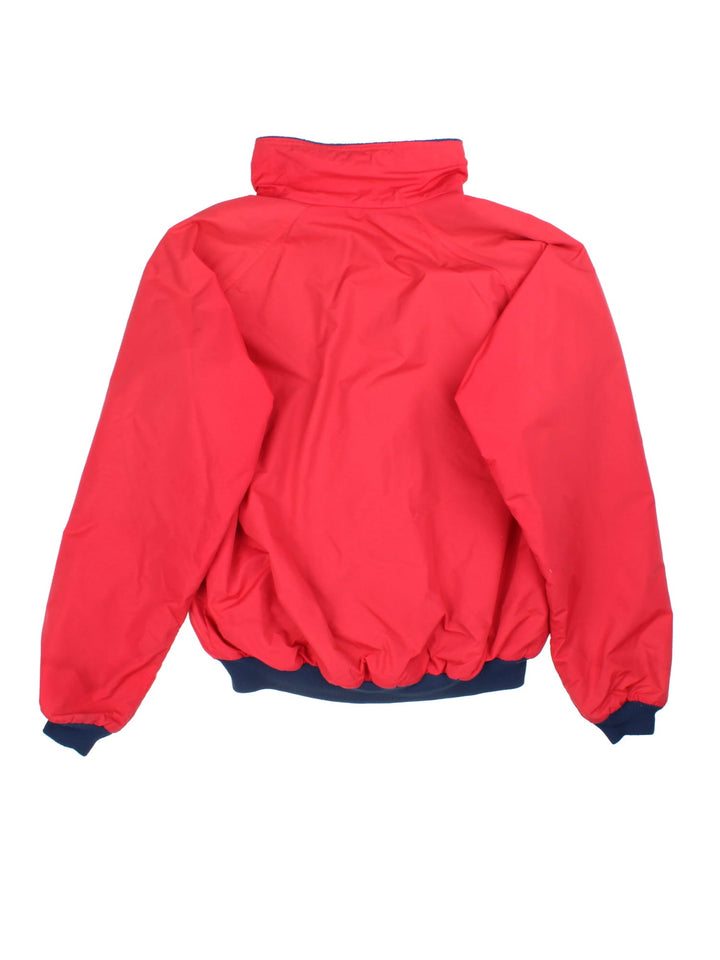 Vintage Patagonia Bomber Jacket in a red colourway. Zips up and has side pockets, insulated with a fleece lining, and has the logos embroidered on the front.