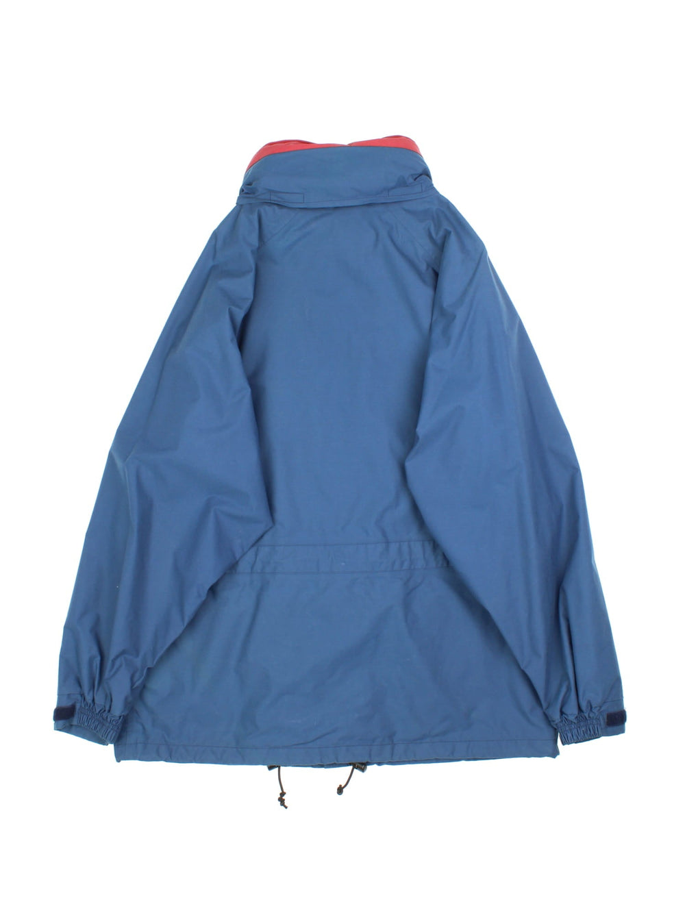 Vintage Berghaus Jacket in a blue colourway. Zips and buttons up, has multiple pockets, hidden hood, and the logo embroidered on the front.