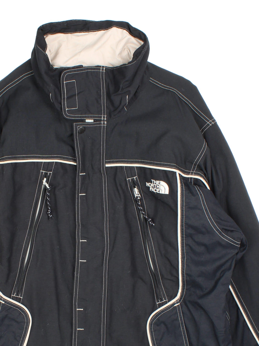 Vintage The North Face Jacket in a black colourway. Zips up and has side pockets, air vent zips on the front, and has the logo embroidered on the front and back.