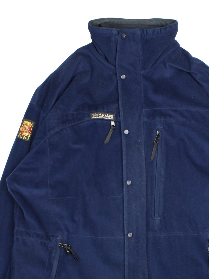 Vintage Paramo Tiaga Fleece in a blue colourway. Zips and buttons up, has multiple pockets, and the logo embroidered on the front and on the right sleeve.