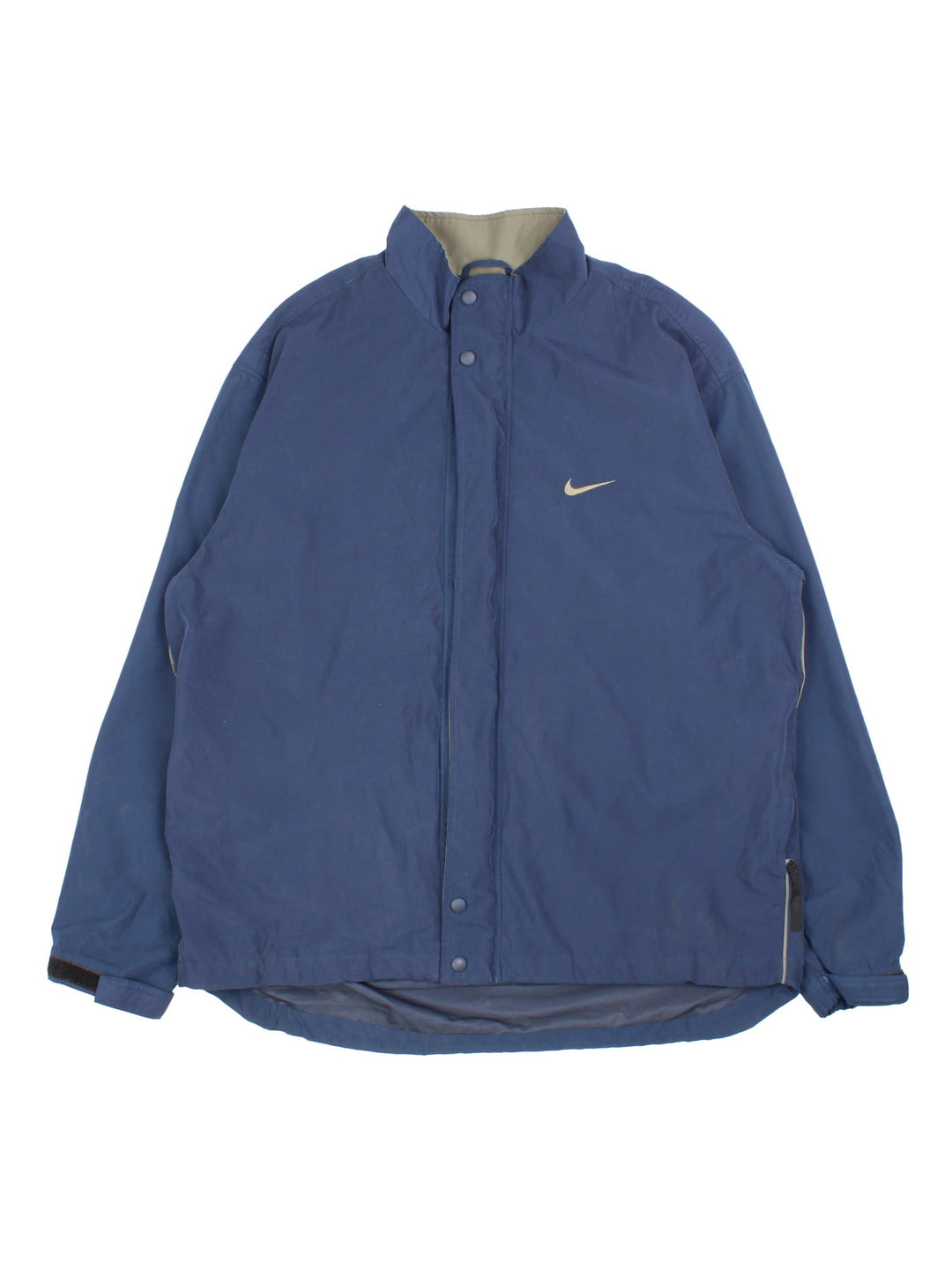 Vintage Nike Golf Windbreaker Jacket in a blue colourway. Zips up and has side pockets, and the swoosh logo embroidered on the front.