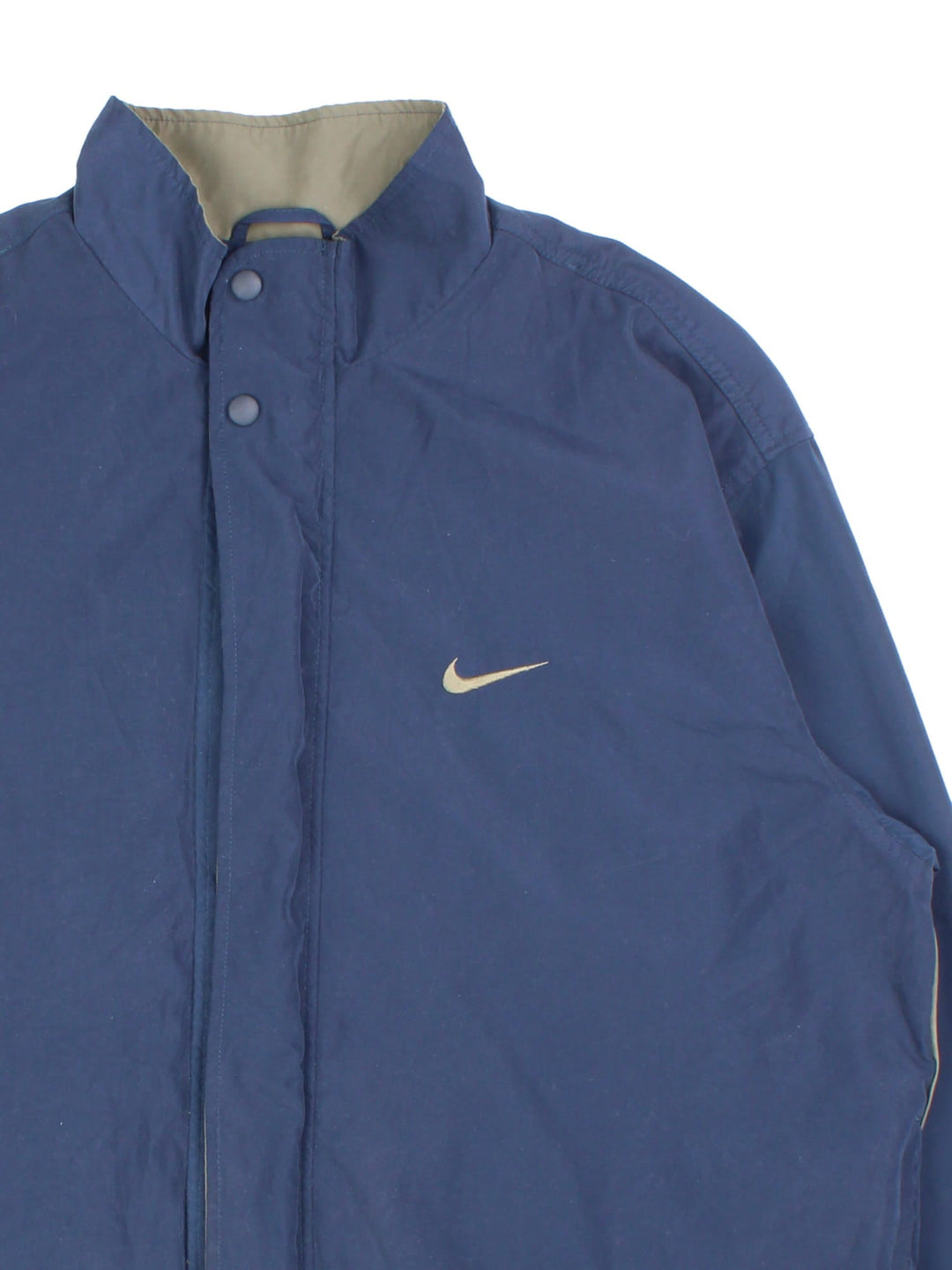 Vintage Nike Golf Windbreaker Jacket in a blue colourway. Zips up and has side pockets, and the swoosh logo embroidered on the front.