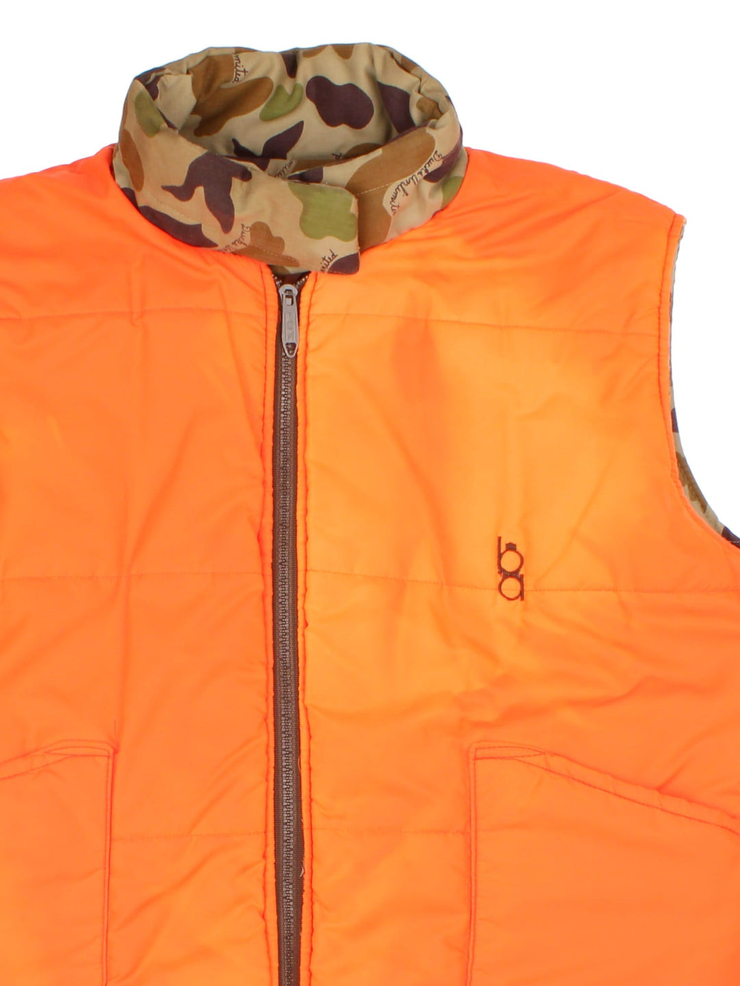 Vintage Reversible Camo Gilet Jacket in either a brown and green camo or orange colourway options. Zips up and has side pockets, insulated lining, and has a embroidered logo on the front.