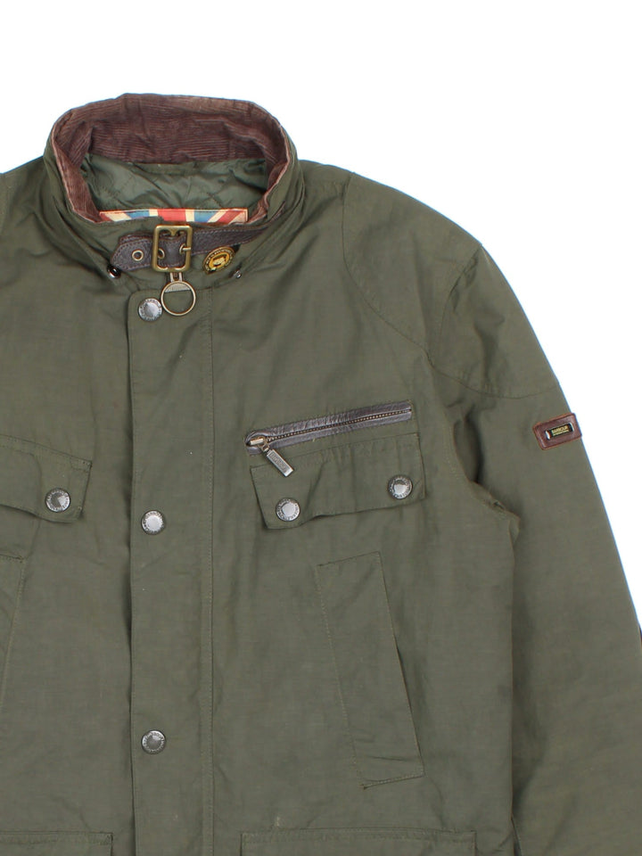 Vintage Barbour International Duke Jacket in a green colourway, popper fastening with x4 front pockets. Slight padding, leather trims and has logo patch on left arm.