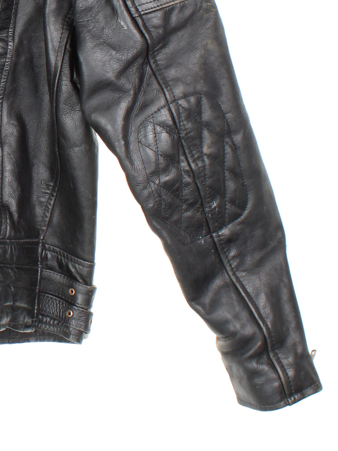 Vintage Leather Biker Jacket in black features zip up pockets, motorcycle detailing, quilted patches and buckle details on the hips.