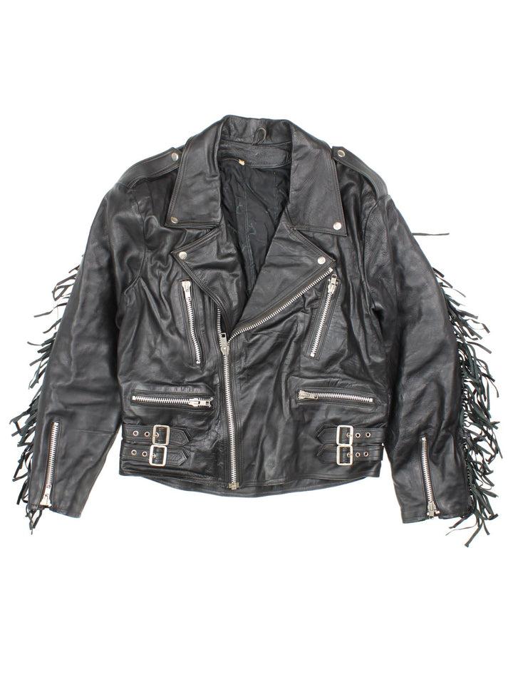 Vintage Fringe Leather Motorcycle Jacket in black features zip up pockets, motorcycle detailing and fringing across back and arms.