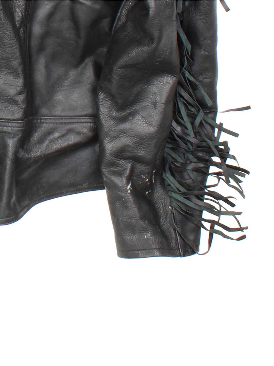 Vintage Fringe Leather Motorcycle Jacket in black features zip up pockets, motorcycle detailing and fringing across back and arms.