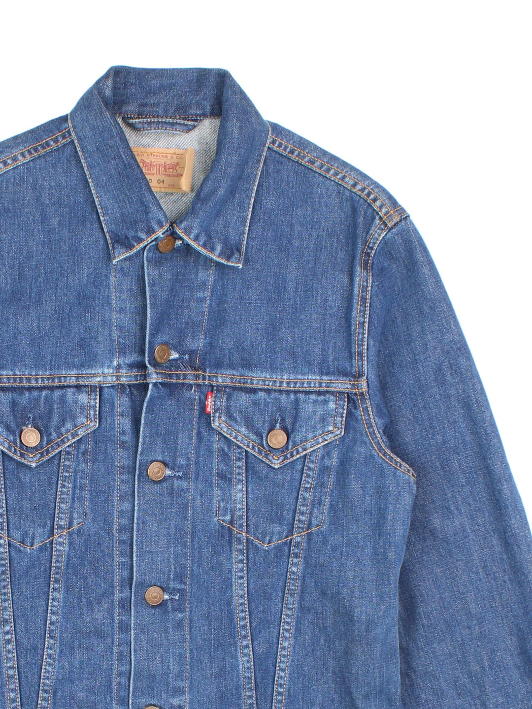 Levi Strauss Denim Jacket in blue, features button fastening, x2 top pockets and classic red tab branding.