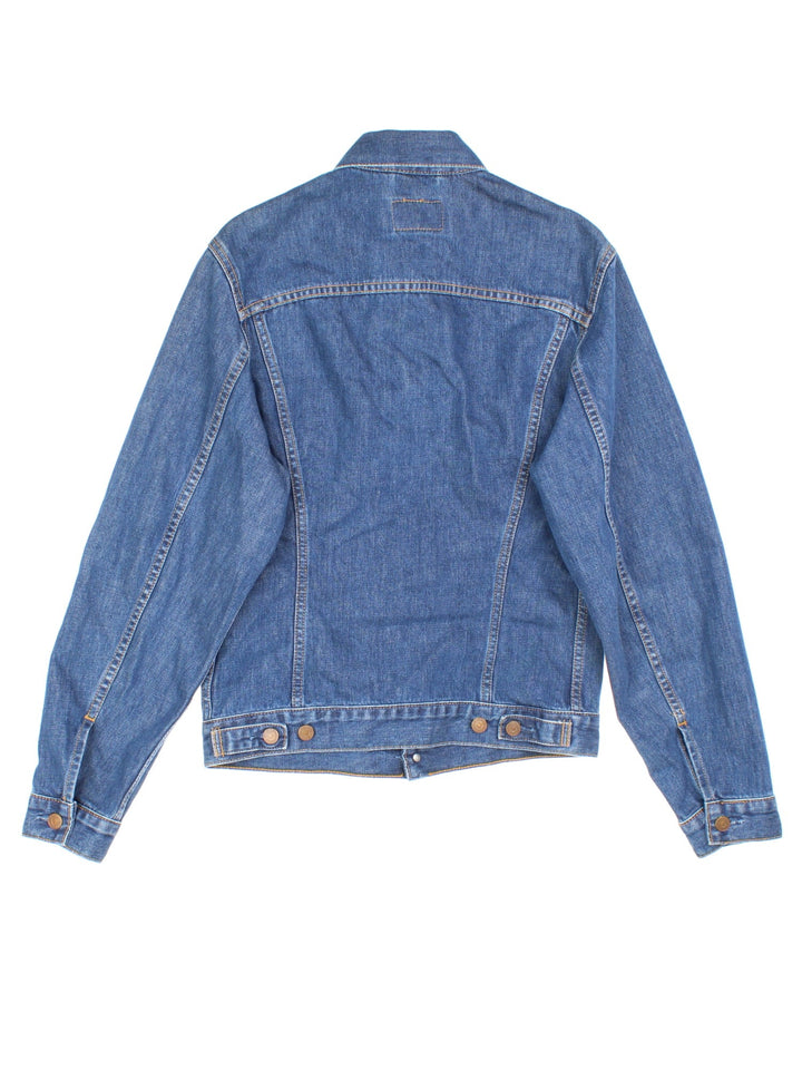 Levi Strauss Denim Jacket in blue, features button fastening, x2 top pockets and classic red tab branding.