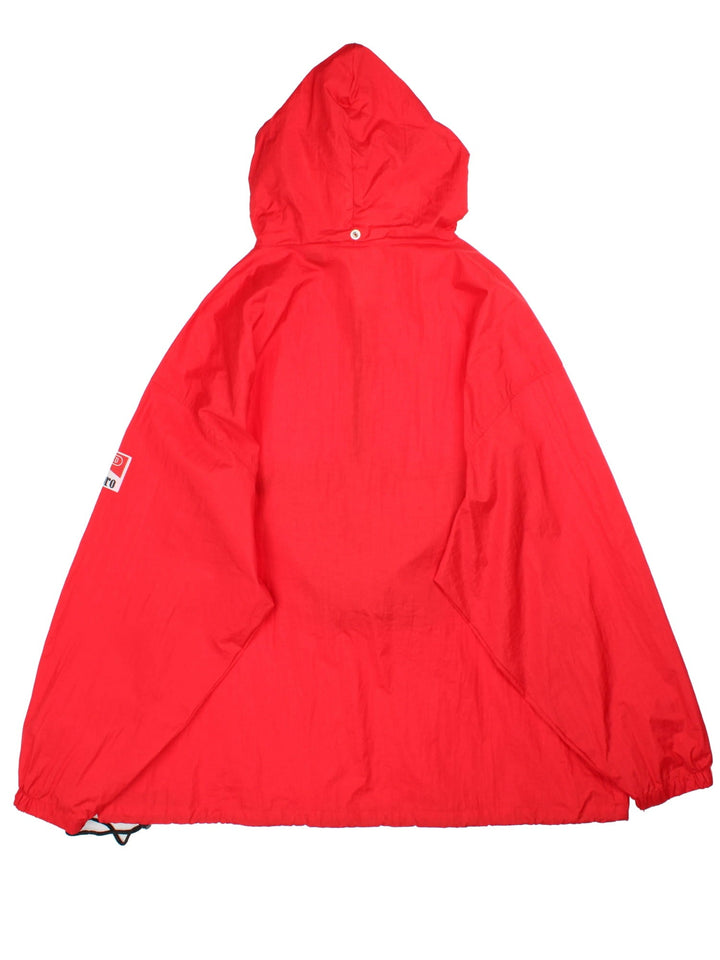 Vintage 90's Marlboro Classics Pullover Windbreaker in a red colourway. Half zip up and has a big pouch pockets, strap feature in the pocket which turns the jacket into a bag, and has the logo badge embroidered on the left sleeve.