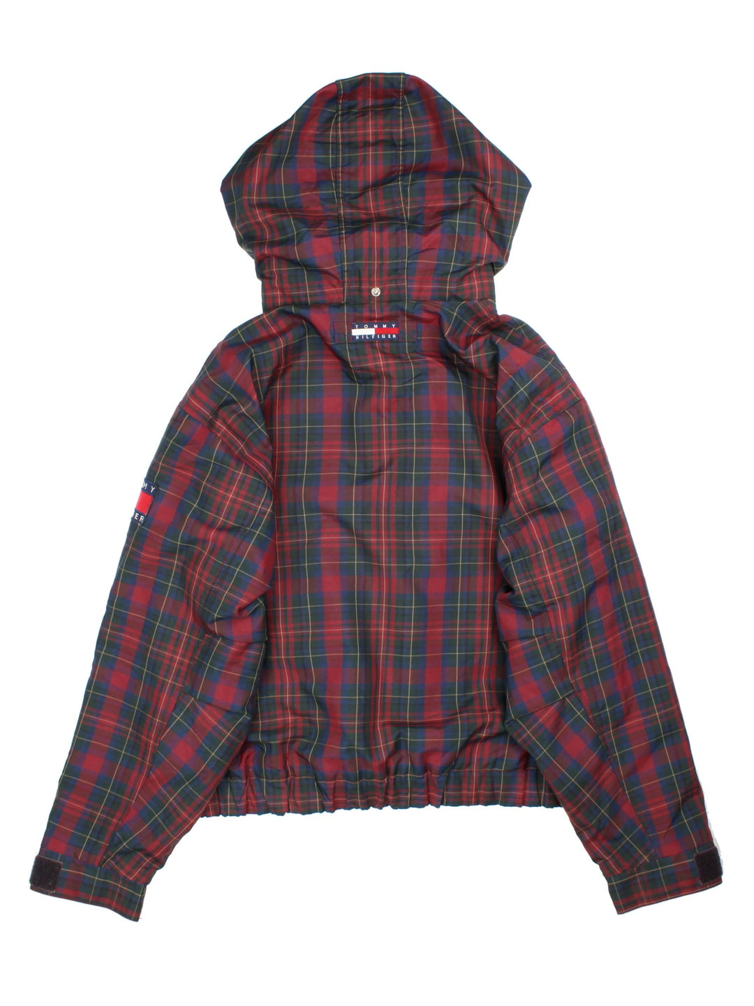 Vintage 90's Tommy Hilfiger Tartan Jacket in a red tartan patterned colourway. Zips up and has multiple pockets, insulated with a fleece lining, and has the logo embroidered on the left sleeve and on the back.