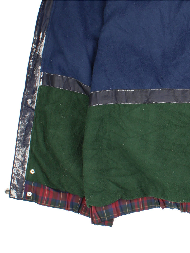 Vintage 90's Tommy Hilfiger Tartan Jacket in a red tartan patterned colourway. Zips up and has multiple pockets, insulated with a fleece lining, and has the logo embroidered on the left sleeve and on the back.