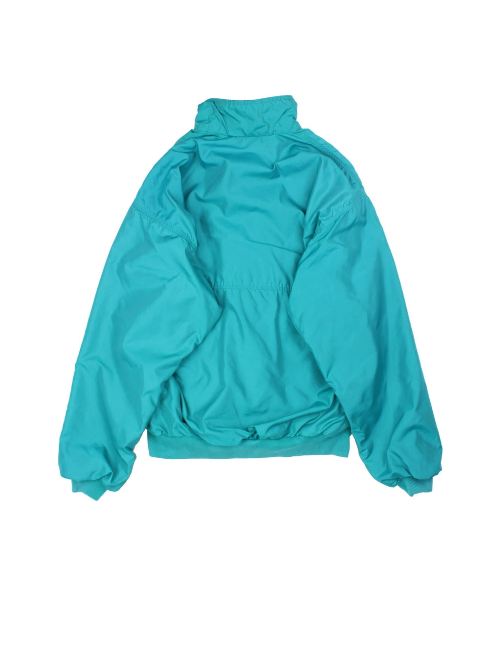 Vintage 90's Patagonia Bomber Jacket in a turquoise blue colourway. Zips up and has side pockets, insulated with a fleece lining, and has the logo embroidered on the front.