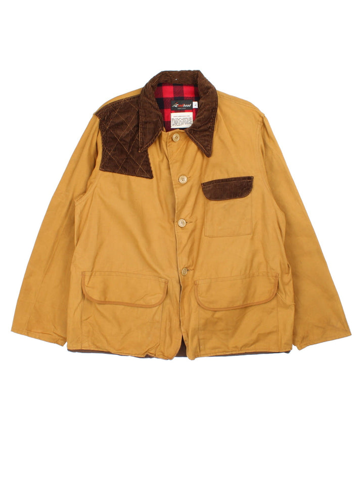 Vintage 80's Redhead Hunting Jacket in a tan brown colourway. Buttons up, has multiple pockets, and has corduroy panel and collar features.