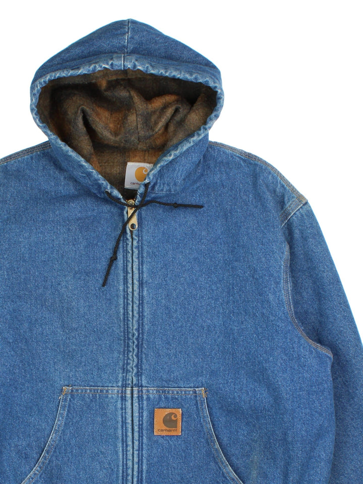 Carhartt Denim Active Jacket in a blue colourway. Full zip with drawstring hood, pocket and small logo on the front