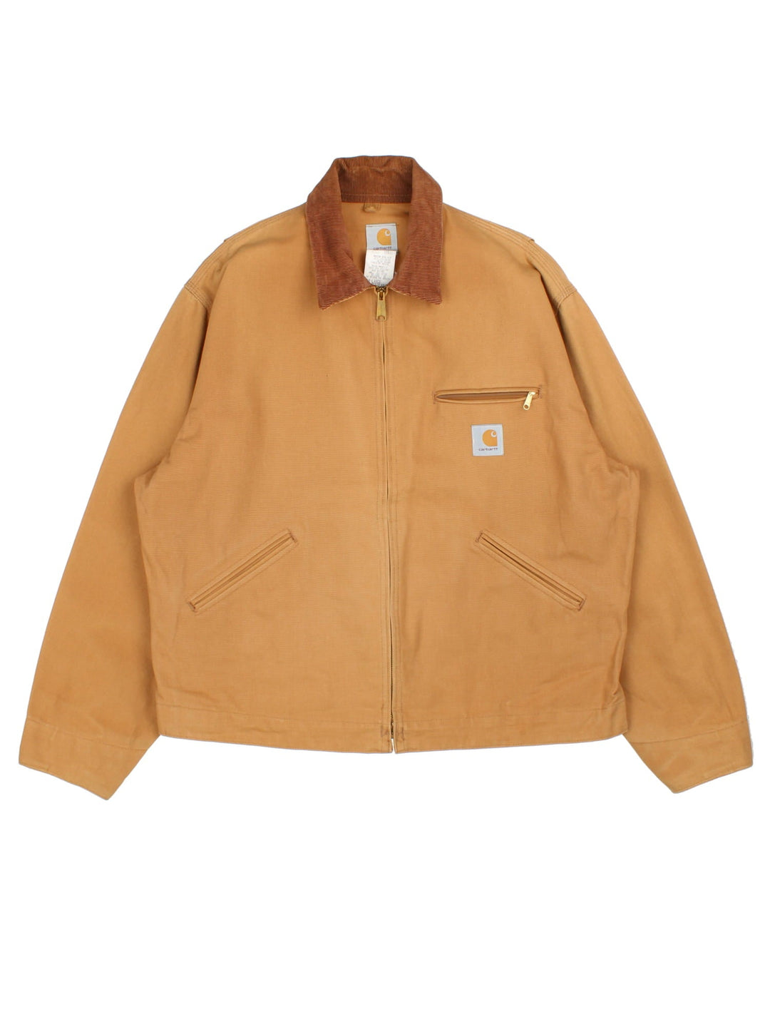 Carhartt Detroit Jacket in a tan colourway. Full zip with multiple pockets on the front. Suede collar, button cuffs and small classic logo on the front.