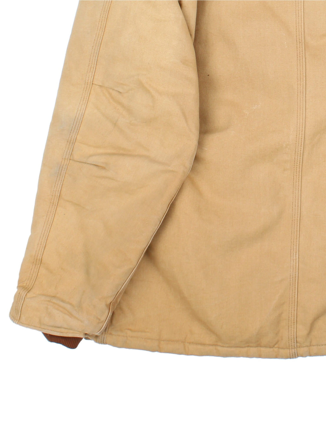 Carhartt Arctic Jacket in a tan colourway. Full zip with multiple large front pockets, suede collar and small classic logo on the front.