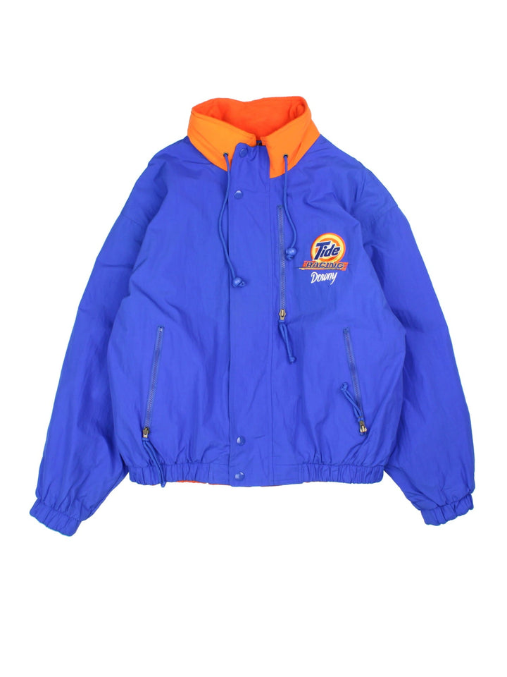 Vintage Tide Racing Downy Nascar Reversible Jacket in a blue and orange colourway with either jacket or fleece reversible options. Zips up and has multiple pockets, insulated lining, hidden hood and has the logo embroidered on the front and back.