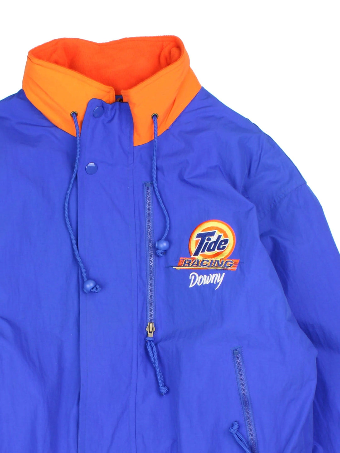 Vintage Tide Racing Downy Nascar Reversible Jacket in a blue and orange colourway with either jacket or fleece reversible options. Zips up and has multiple pockets, insulated lining, hidden hood and has the logo embroidered on the front and back.