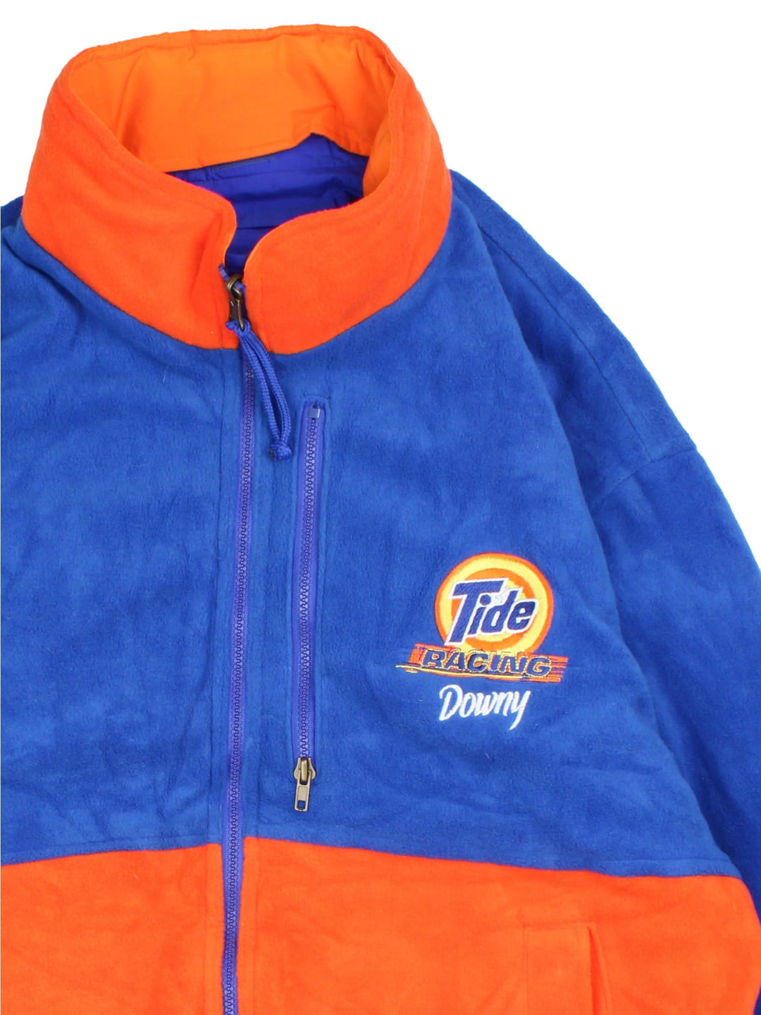 Vintage Tide Racing Downy Nascar Reversible Jacket in a blue and orange colourway with either jacket or fleece reversible options. Zips up and has multiple pockets, insulated lining, hidden hood and has the logo embroidered on the front and back.