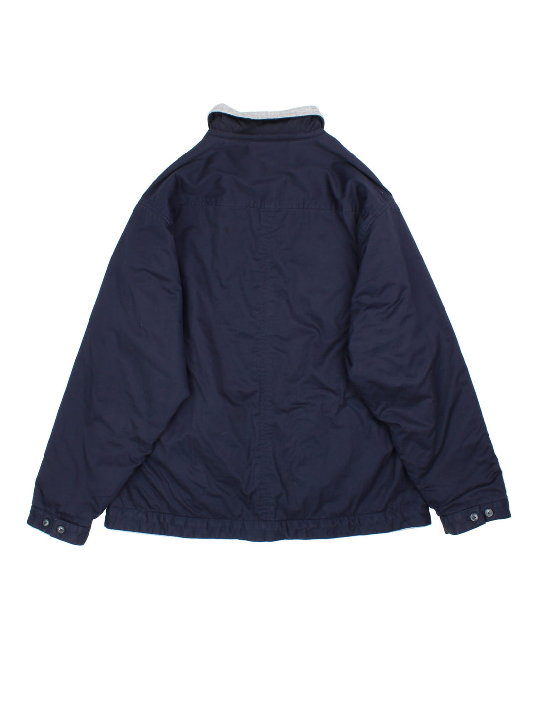 Lacoste Reversible Bomber Jacket in a blue and grey colourway with either jacket or fleece reversible options. Zips up and has side pockets, insulated lining, and has the logo embroidered on the front.