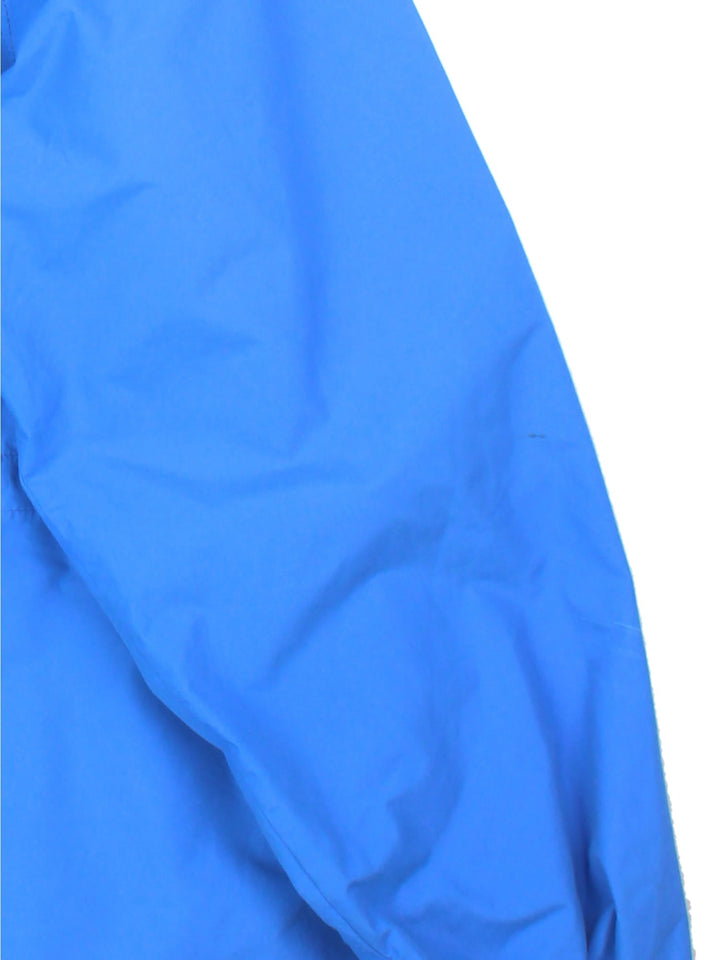 Vintage The North Face Gore-Tex Jacket in a blue colourway. Zips and buttons up, has multiple pockets, and a detachable hood.