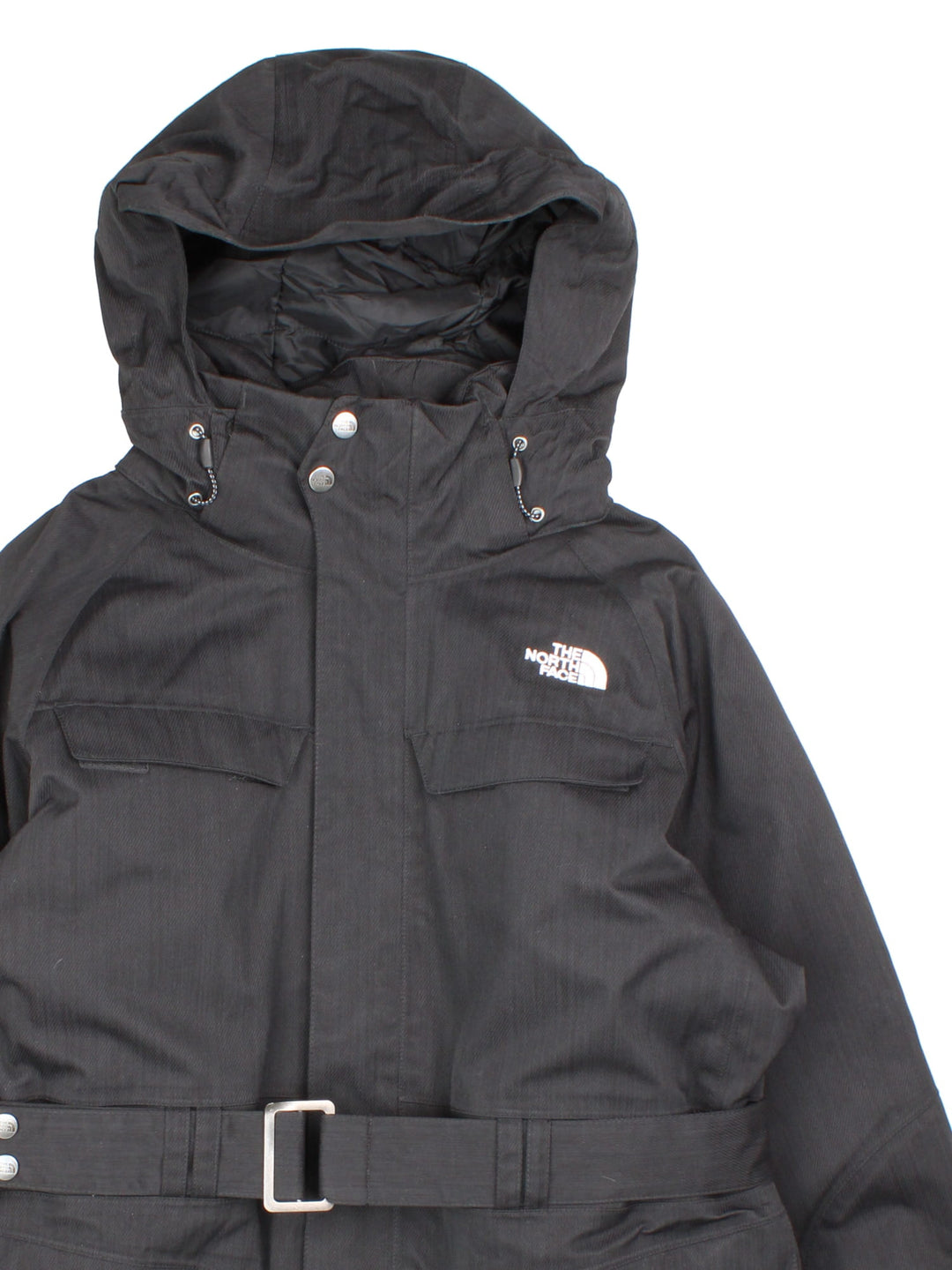 The North Face 550 Hyvent Parka Coat in a black colourway. Zips up and has multiple pockets, hooded, insulated lining, belt feature, and has the logo embroidered on the front and back.