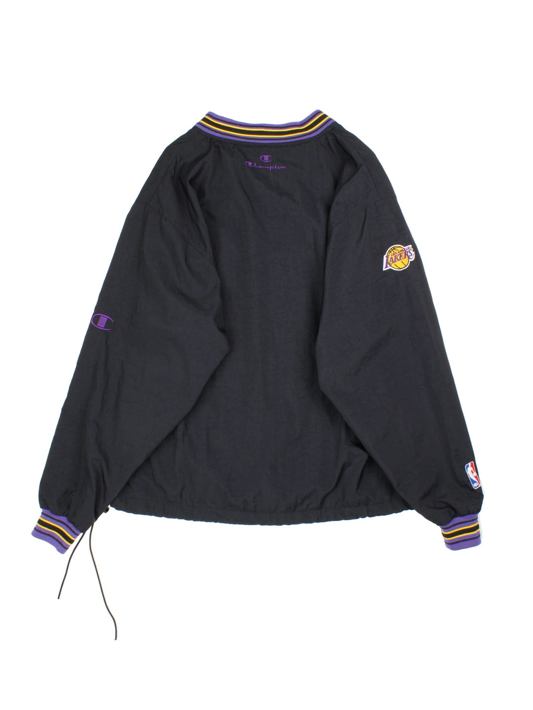 Vintage Champion Los Angeles Laker NBA Drill Training Top in a black colourway. Pullover with a v neck collar, has side pockets, and the team spell out logo embroidered on the front.