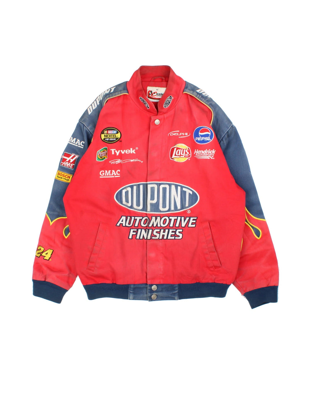 Vintage Dupont Nascar Jacket in a red colourway. Buttons up and has side pockets, and the logos and sponsors embroidered on the front and back.