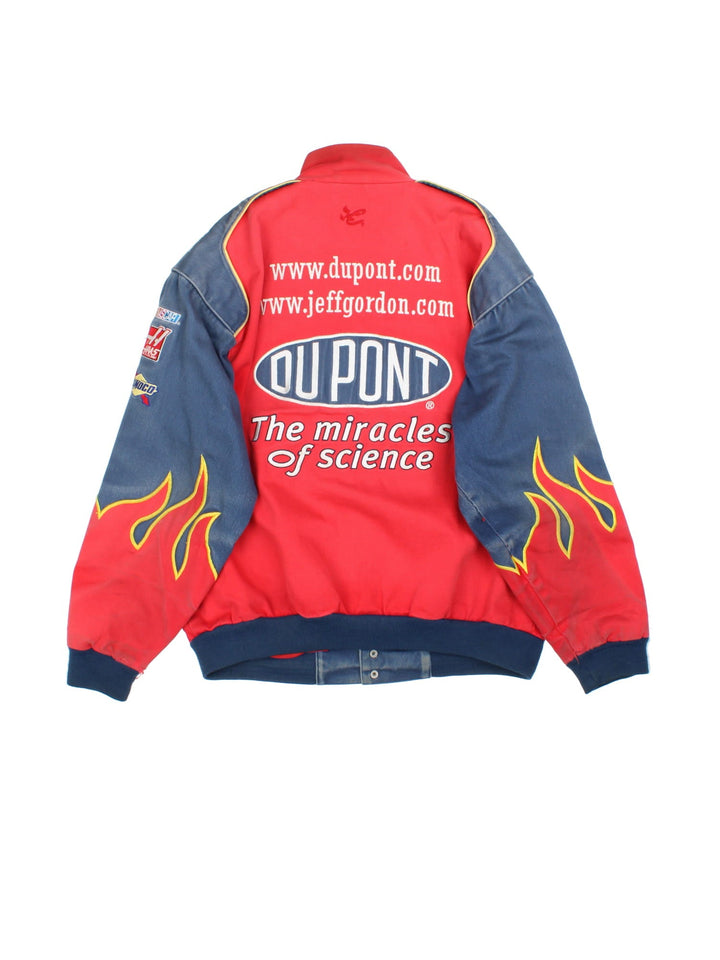 Vintage Dupont Nascar Jacket in a red colourway. Buttons up and has side pockets, and the logos and sponsors embroidered on the front and back.