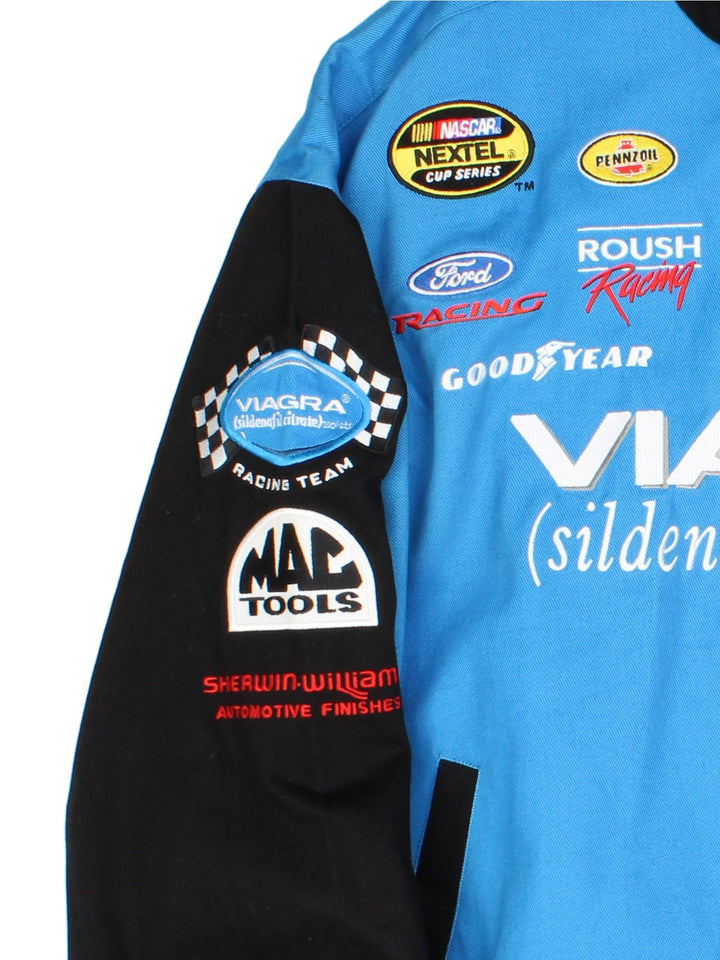 Vintage Mark Martin Viagra Nascar Jacket in a blue and black colourway. Buttons up and has side pockets, and the logos and sponsors embroidered on the front and back.