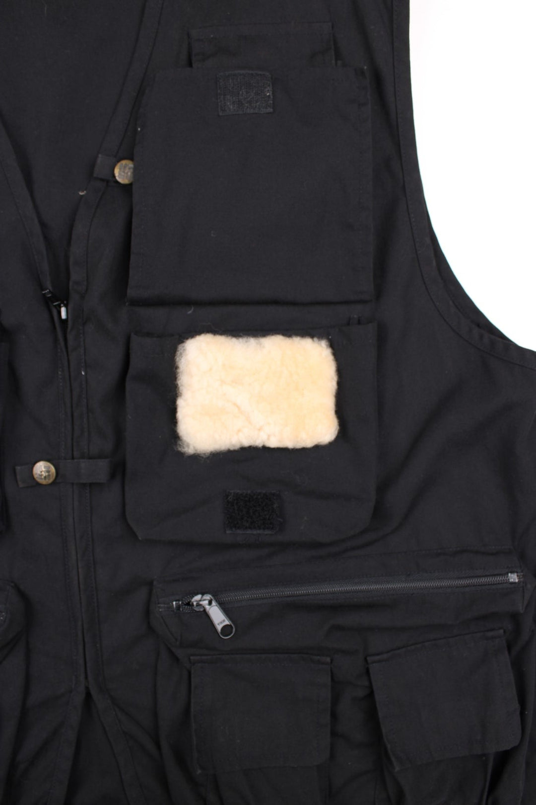 Vintage Columbia PFG Fishing Vest Gilet in a black colourway. Zips up and has multiple utility pockets, and has the logo embroidered on the back.