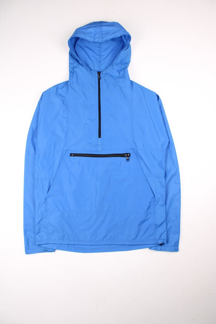 Vintage L.L Bean Lightweight Anorak Jacket in a blue colourway. Half zip up, hooded, and has pouch pockets.