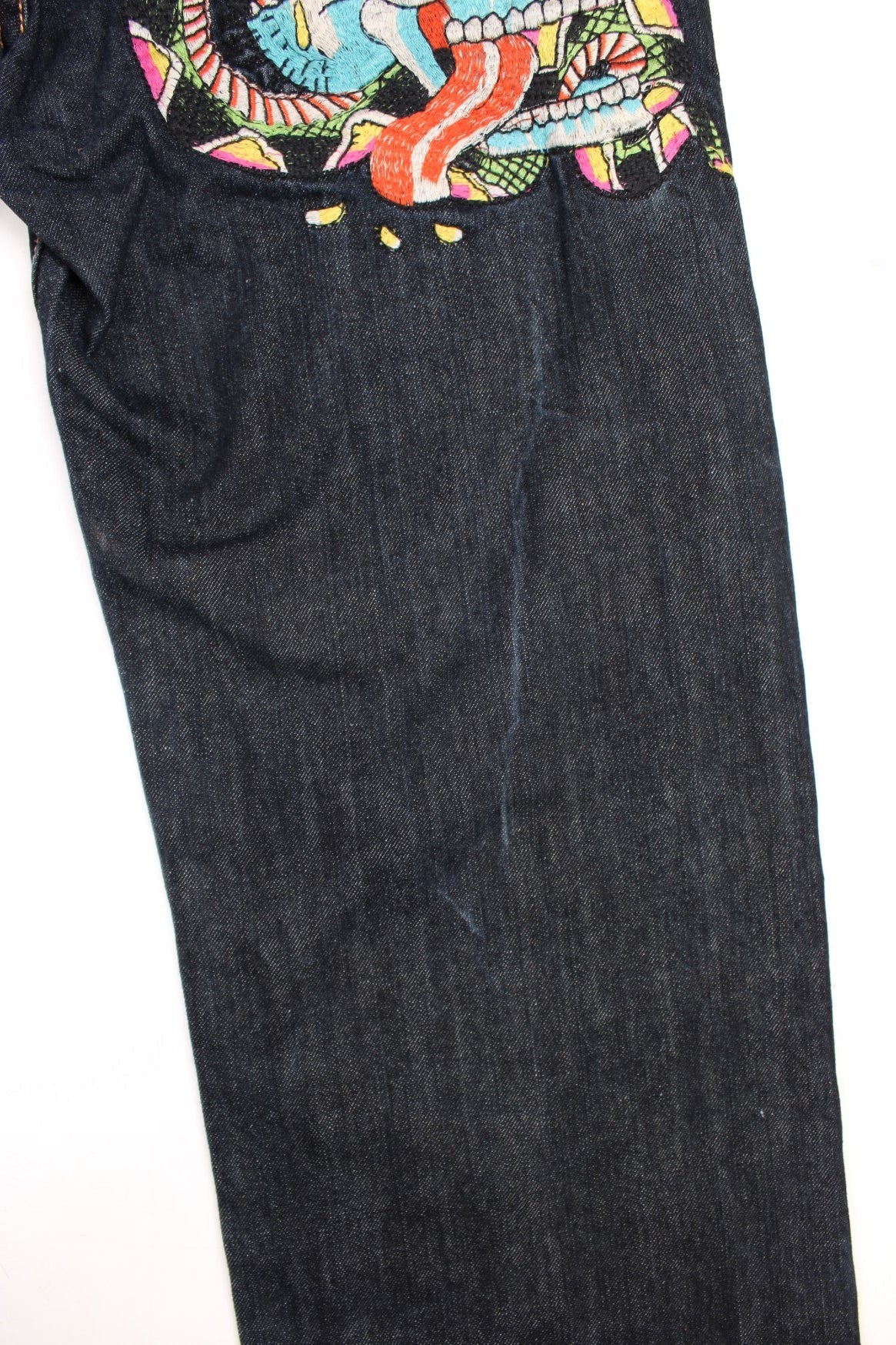 Y2K  Jeans in a  colourway with embroidered skull & eagle on the back and has multiple pockets.