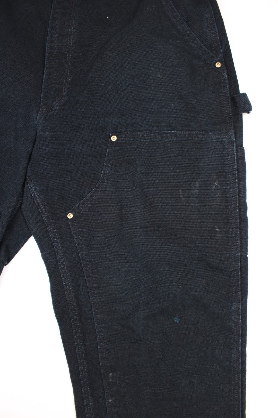  Double Knee Jeans in a  colourway, has multiple pockets and the logo embroidered on the back.