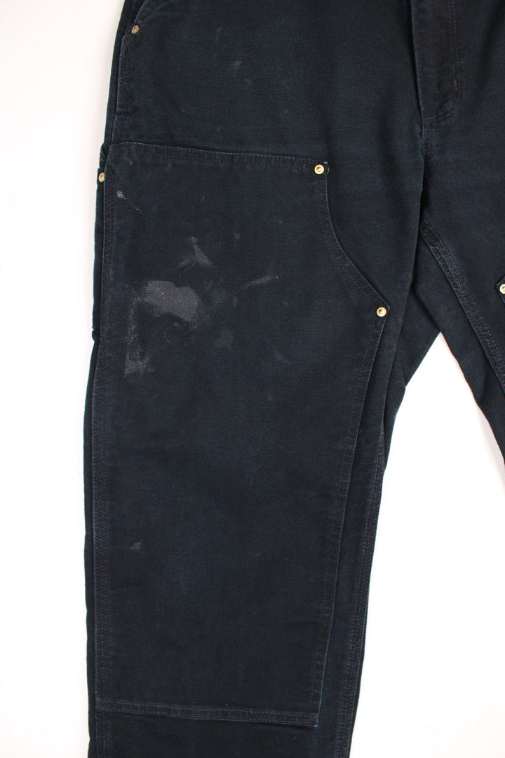  Double Knee Jeans in a  colourway, has multiple pockets and the logo embroidered on the back.