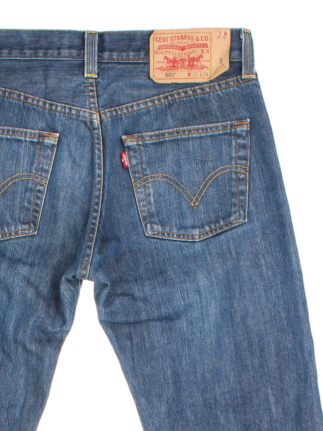 Levi Strauss 501 Jeans in med blue wash colourway with multiple pockets and the logo tab embroidered on the back.